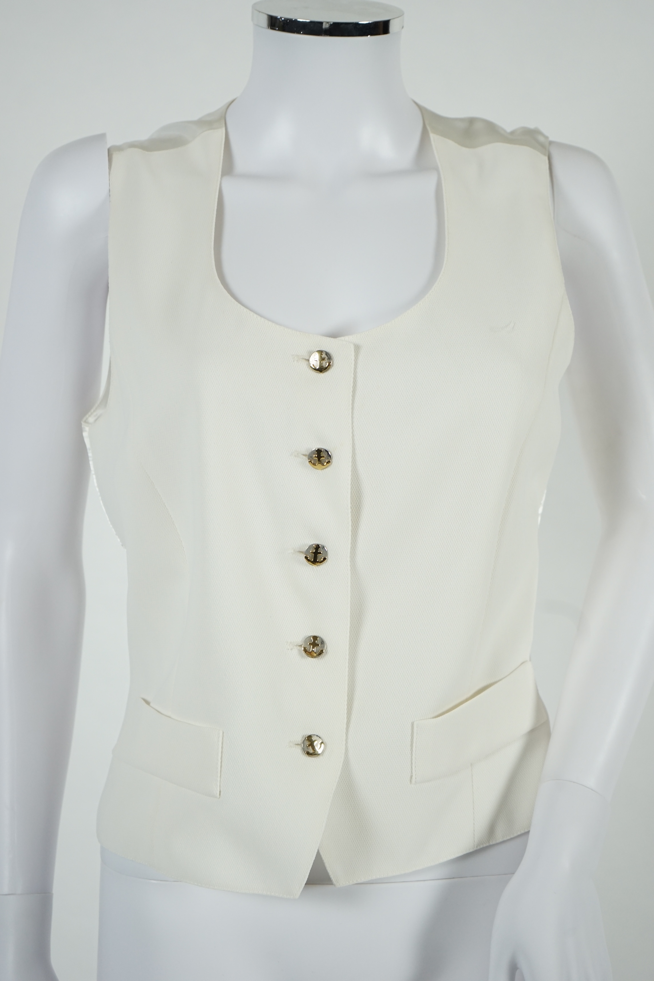 A vintage Yves Saint Laurent variation lady's off white three piece trouser suit with skirt (four pieces), F 40 (UK 12). Proceeds to Happy Paws Puppy Rescue